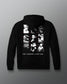 Back view of a black hoodie featuring a grid of grayscale and red-accented photo portraits depicting various moments in a wrestler's life and career of Dave Schultz. Beneath the collage, bold white text reads: “THE LEGEND LIVES ON...”