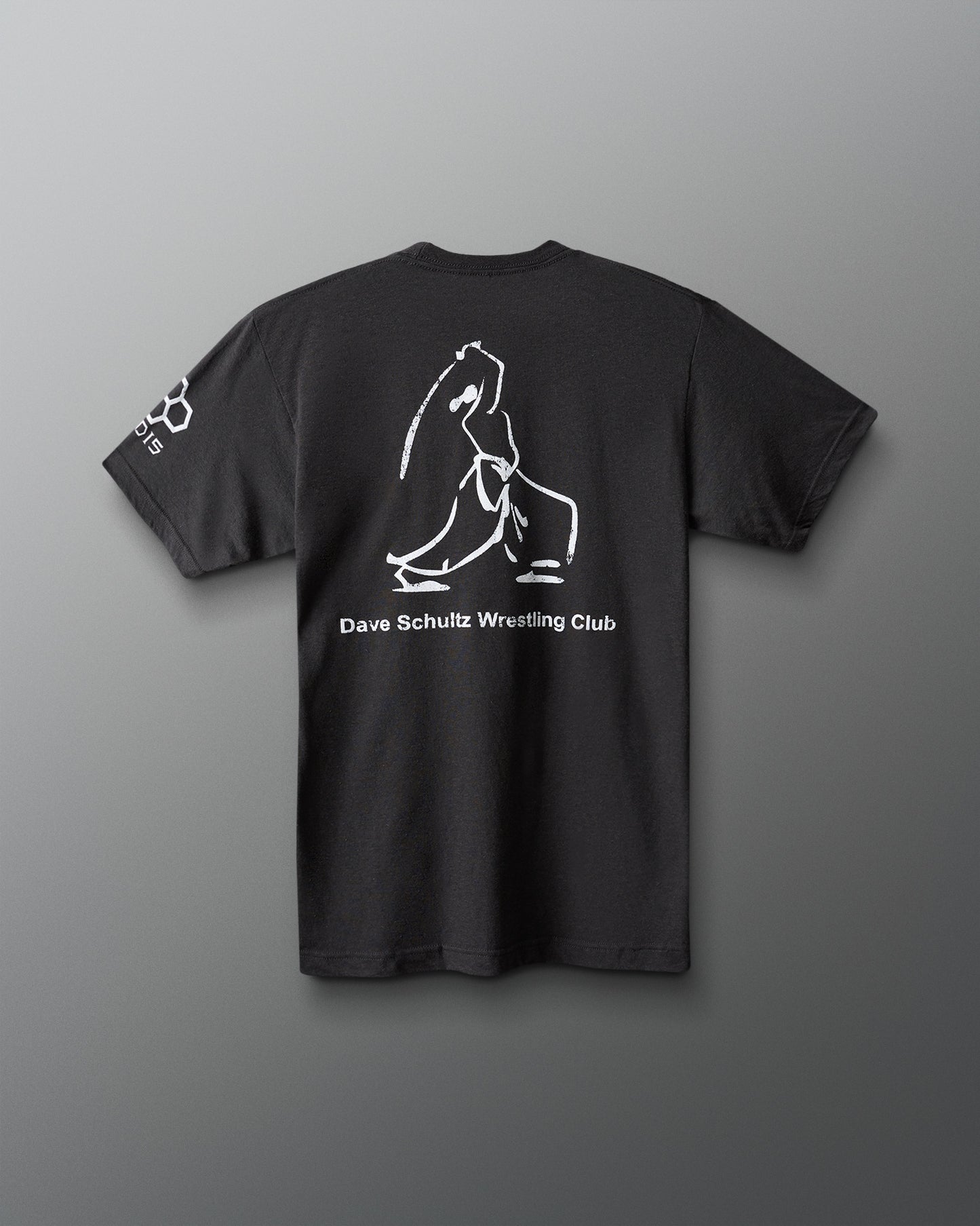 Black t-shirt with white graphic and text on a gray background