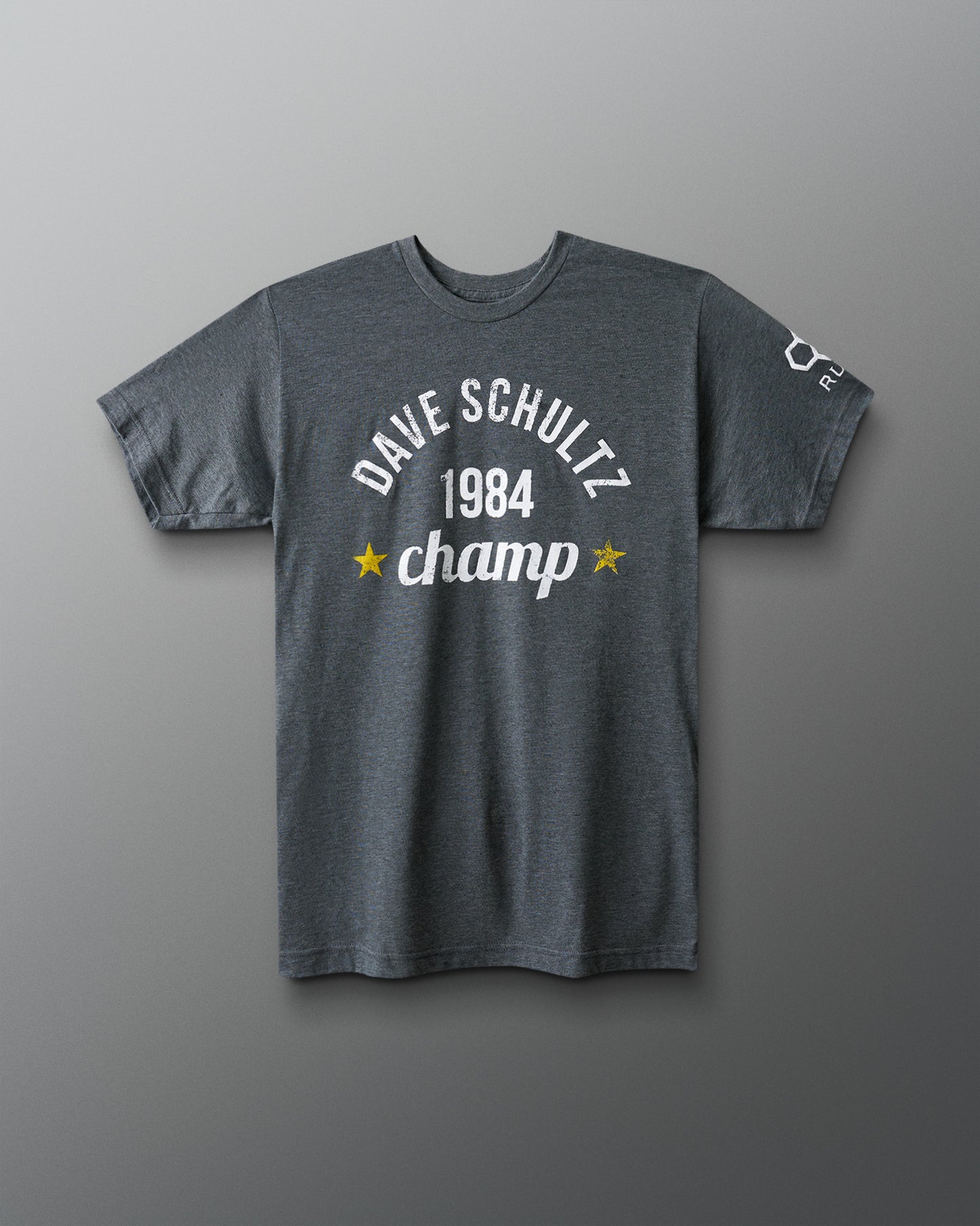 Gray t-shirt with 'Dave Schultz 1984 champ' text on a gray background
