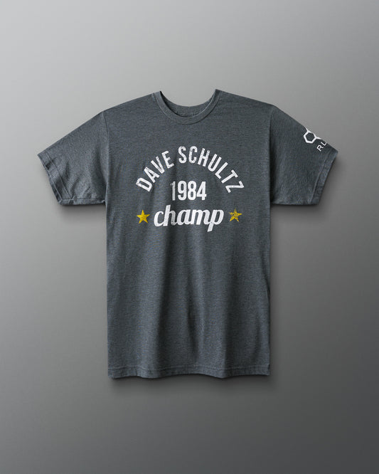 Gray t-shirt with 'Dave Schultz 1984 champ' text on a gray background