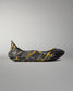 Side profile of RUDIS black and yellow wrestling shoe cover featuring a marbled design and raised protective sole.