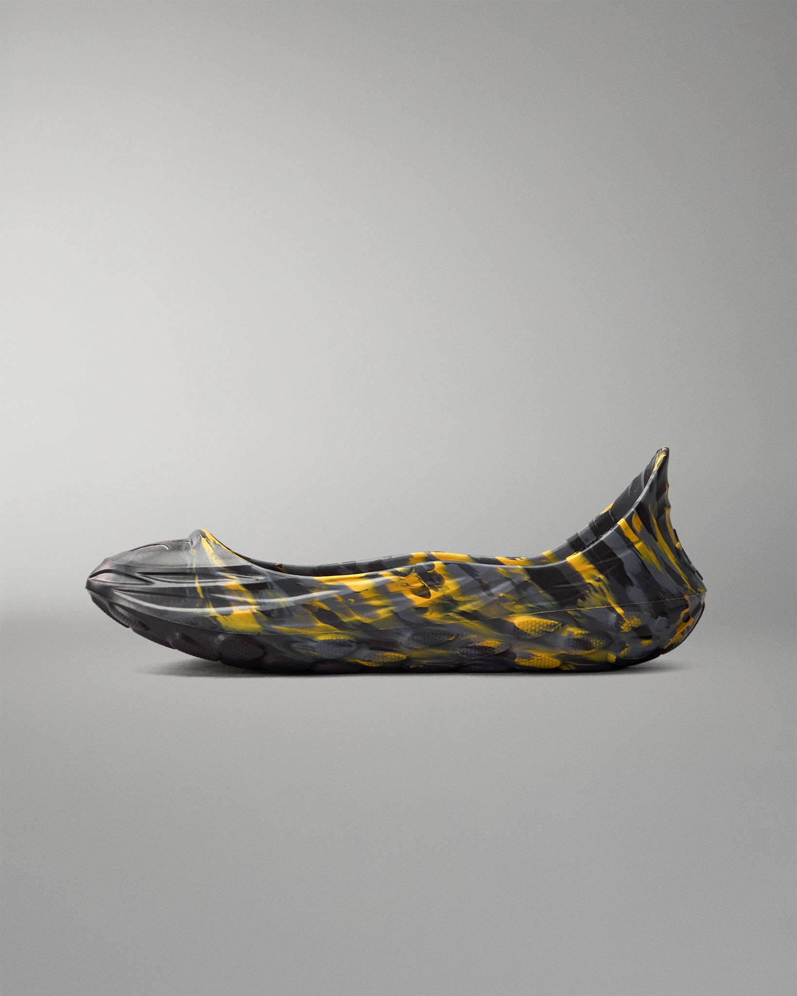 Opposite side view of the RUDIS black and yellow wrestling shoe cover with marbled yellow accents and extended heel protection.