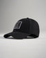 A stylish black cap featuring a minimalistic design with a logo patch on the front and a curved brim