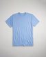 A folded blue t-shirt displayed on a light gray background showcasing a casual and comfortable style