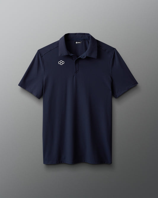 Navy polo shirt with a logo on a gray background