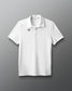 White polo shirt with a logo on a gray background