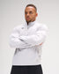 Model wearing the Lunar RUDIS Victory 1/4 Zip performance pullover with quarter-zip collar, RUDIS chest mark, and ventilated side panels.