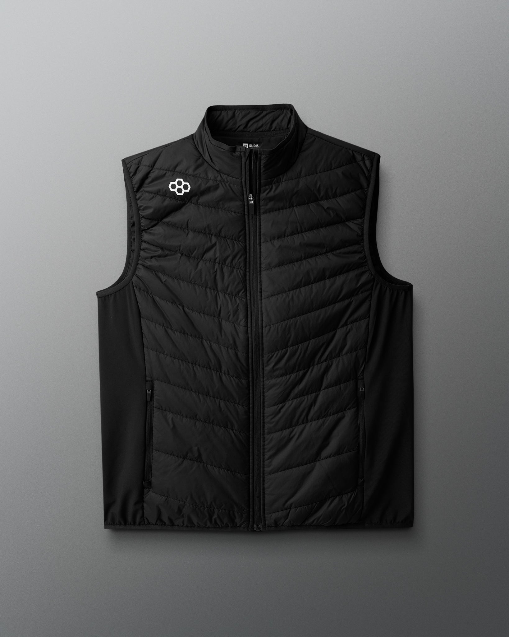 Black quilted vest with a brand logo on a gray background