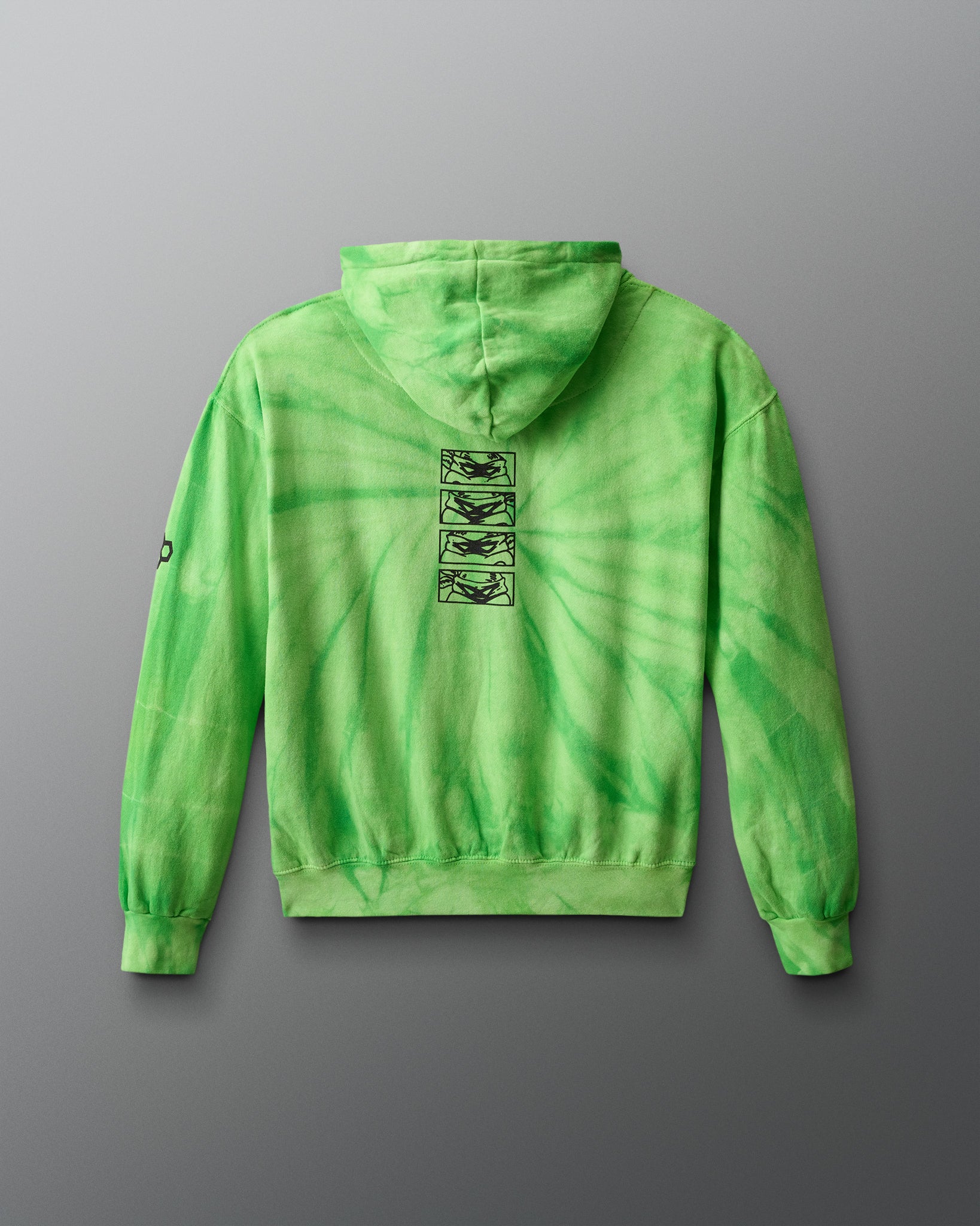 Green tie-dye hoodie with black graphic on the back against a gray background. TMNT. Teenage Mutant Ninja Turtle