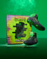 Black and green Wrestling shoes with 'Teenage Mutant Ninja Turtles' branding next to a box on a green background