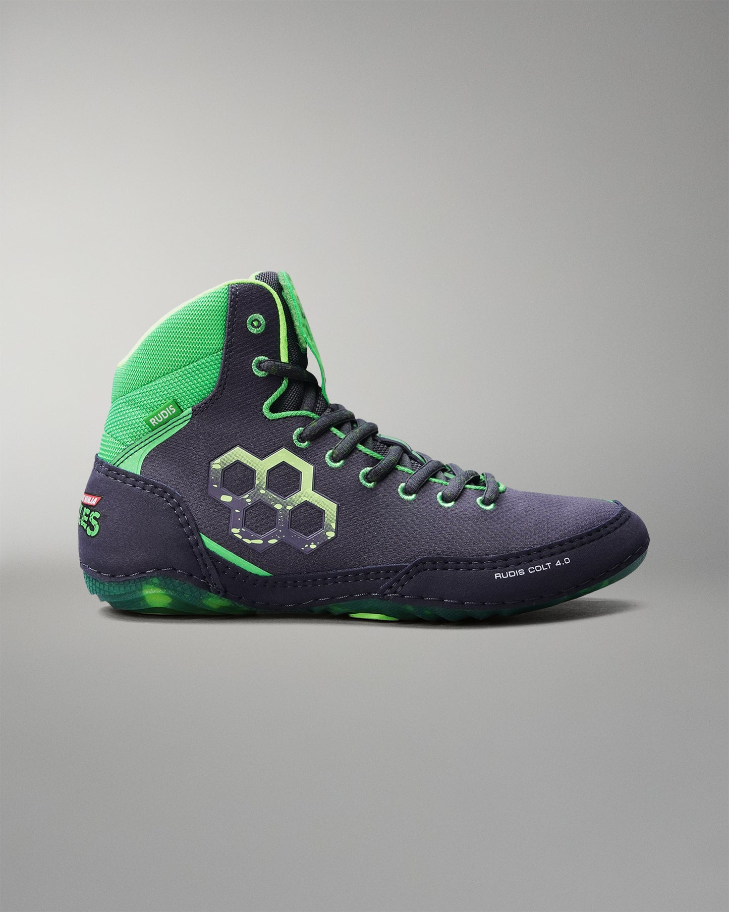 Navy and green Wrestling shoe on a gray background