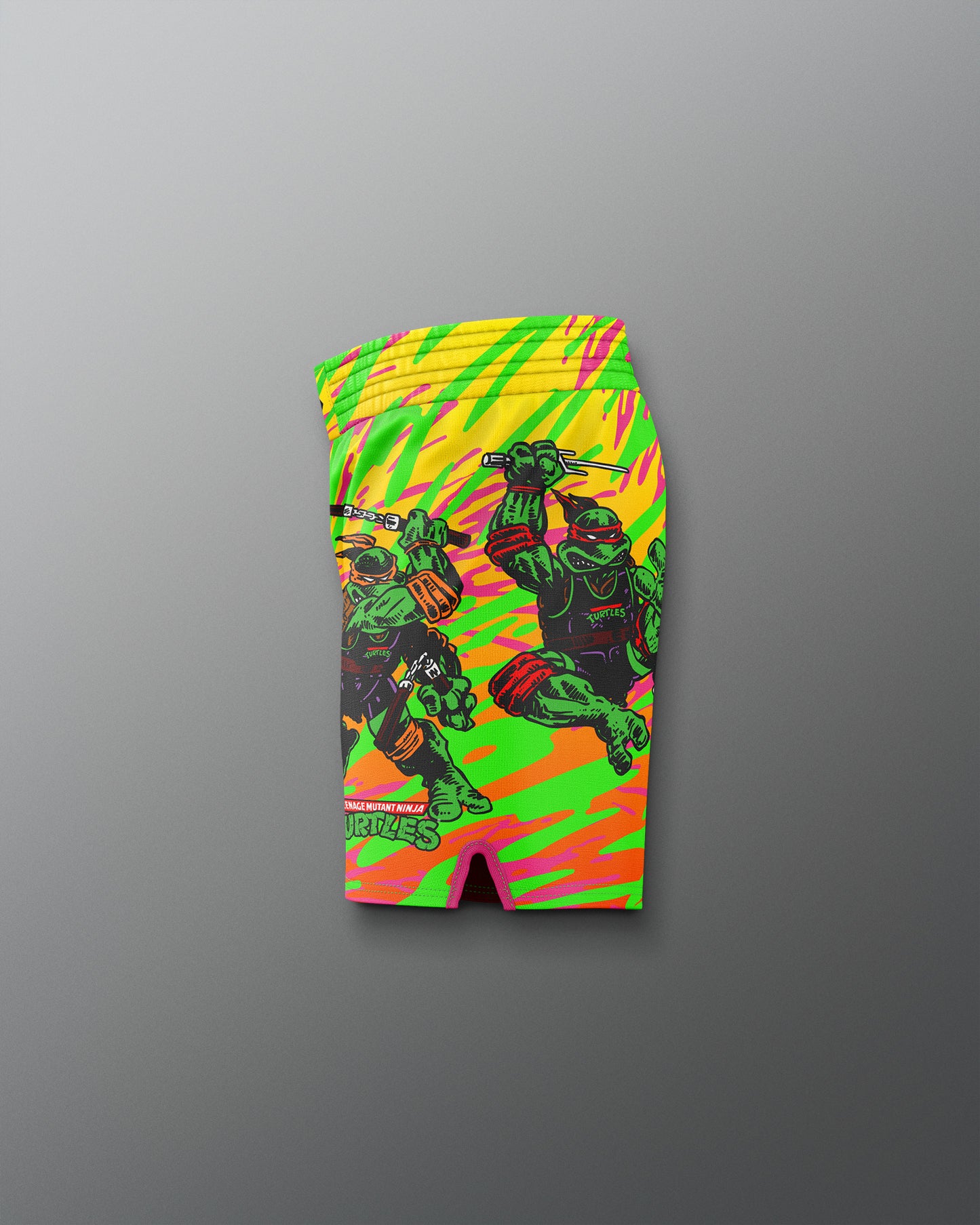 Colorful shorts with a graphic design on a gray background
