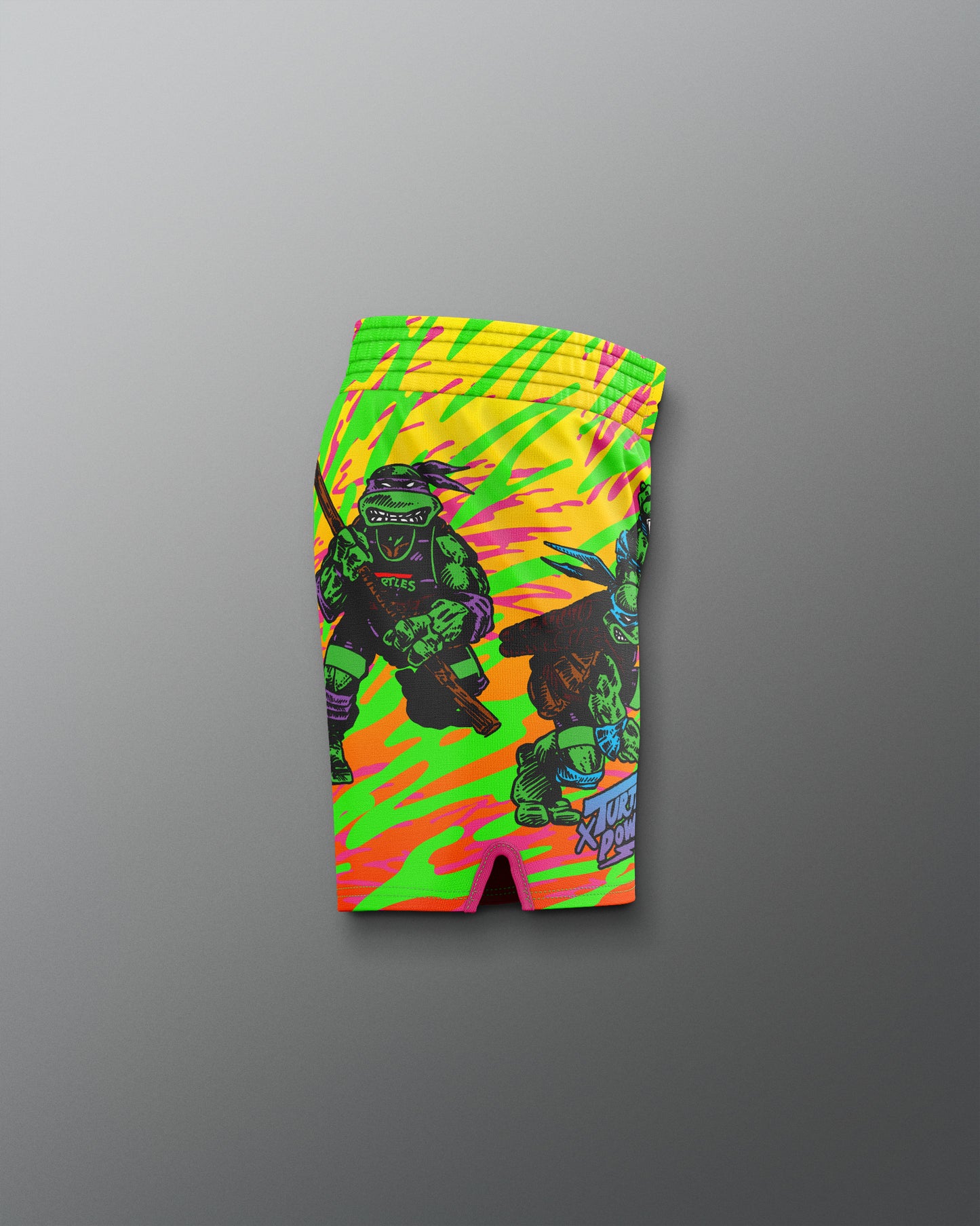 Colorful shorts with a character design on a gray background