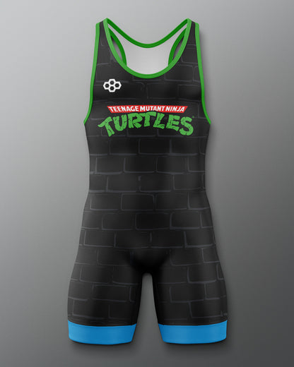 Black wrestling singlet with green and blue accents featuring 'Teenage Mutant Ninja Turtles' text on a gray background.
