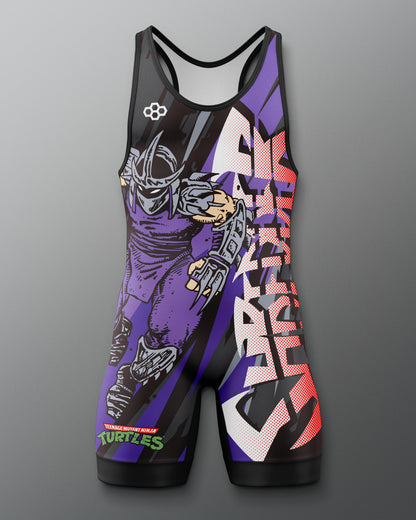 Colorful wrestling singlet with a Teenage Mutant Ninja Turtle Shredder graphic design on a gray background