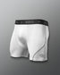 White athletic boxer shorts with black waistband on a gray background