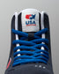 Black wrestling shoe with blue laces and USA Wrestling logo on a gray background