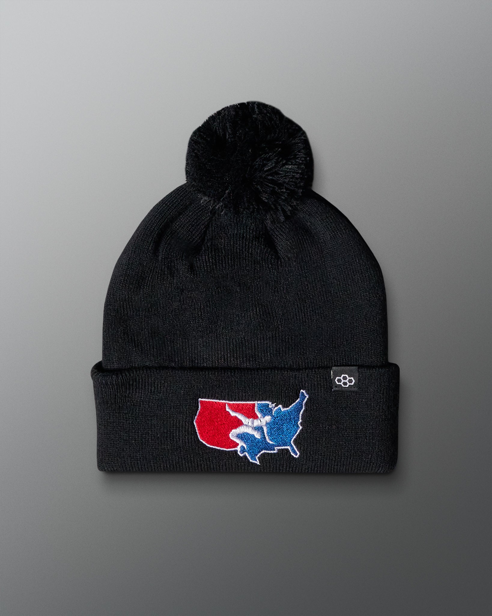 Black beanie with a colorful map design on a gray background