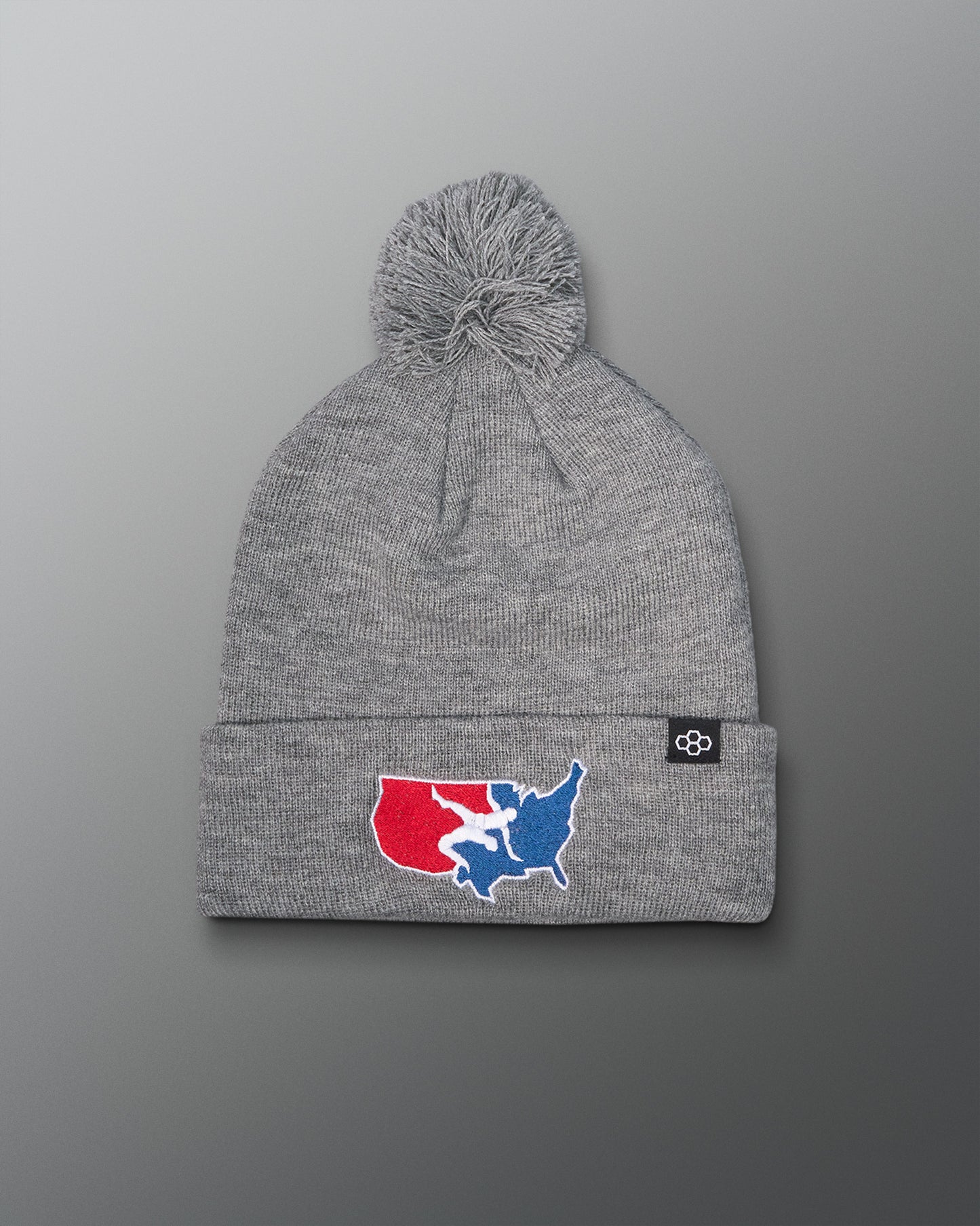Gray beanie with a logo on a gray background