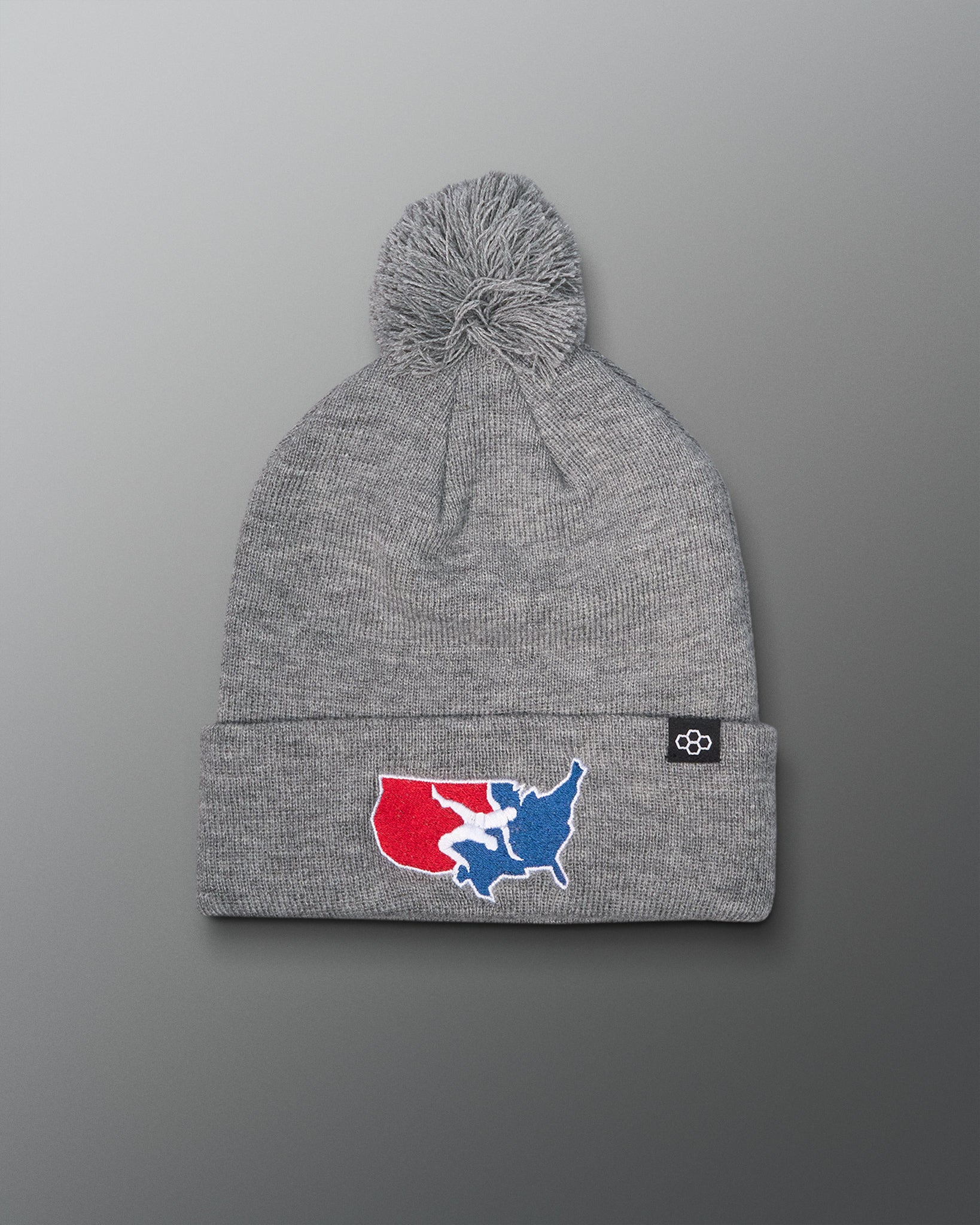 Gray beanie with a logo on a gray background