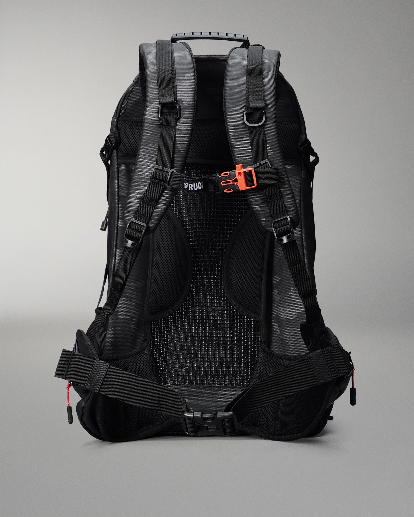 Black and gray backpack with orange accents on a gray background