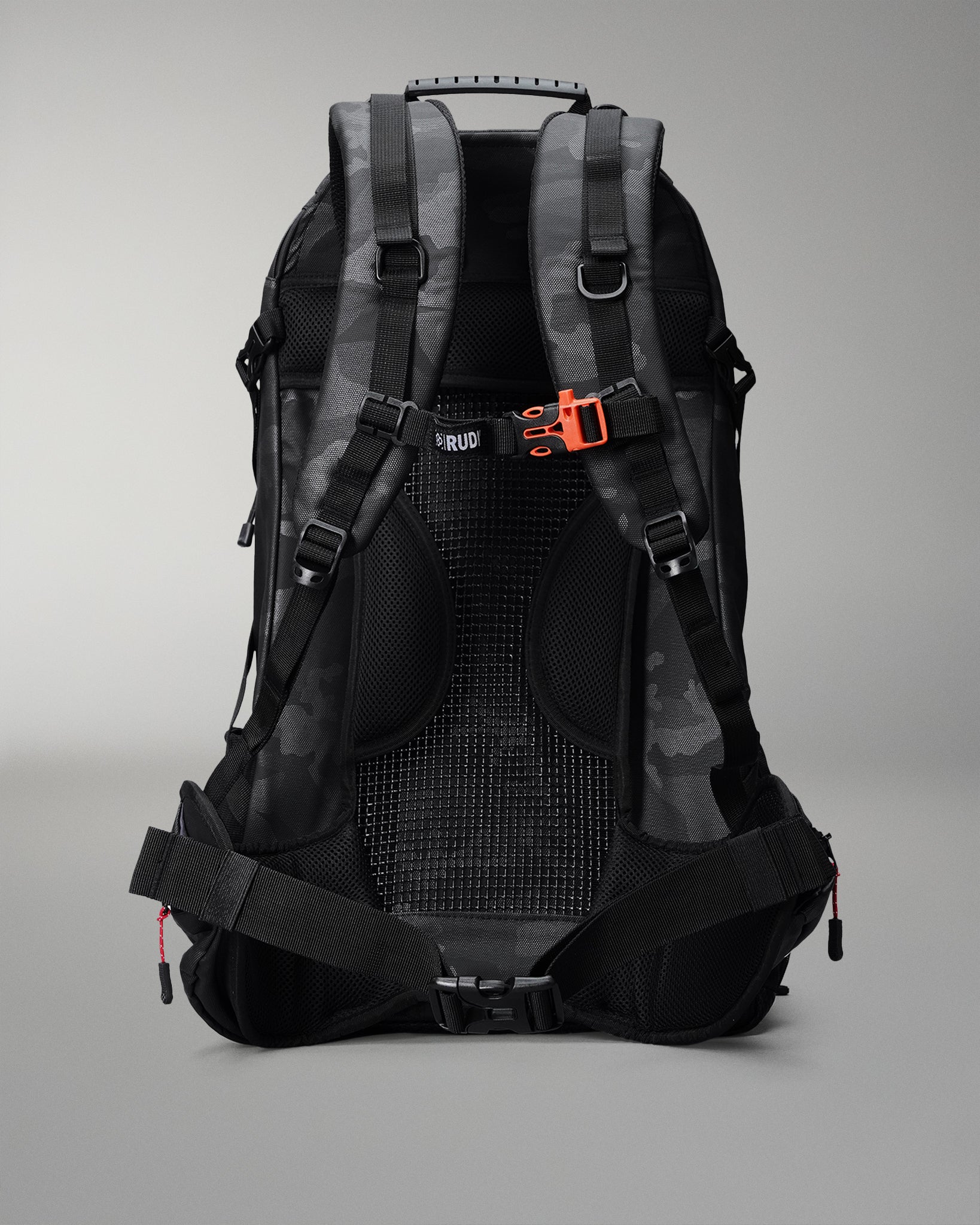 Black and gray backpack with orange accents on a gray background
