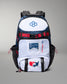 A USA Wrestling branded backpack in navy blue, white, and black, featuring red accents and team logos, shown against a neutral gray background.