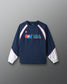 Navy long-sleeve shirt with USA Wrestling logo on a gray background