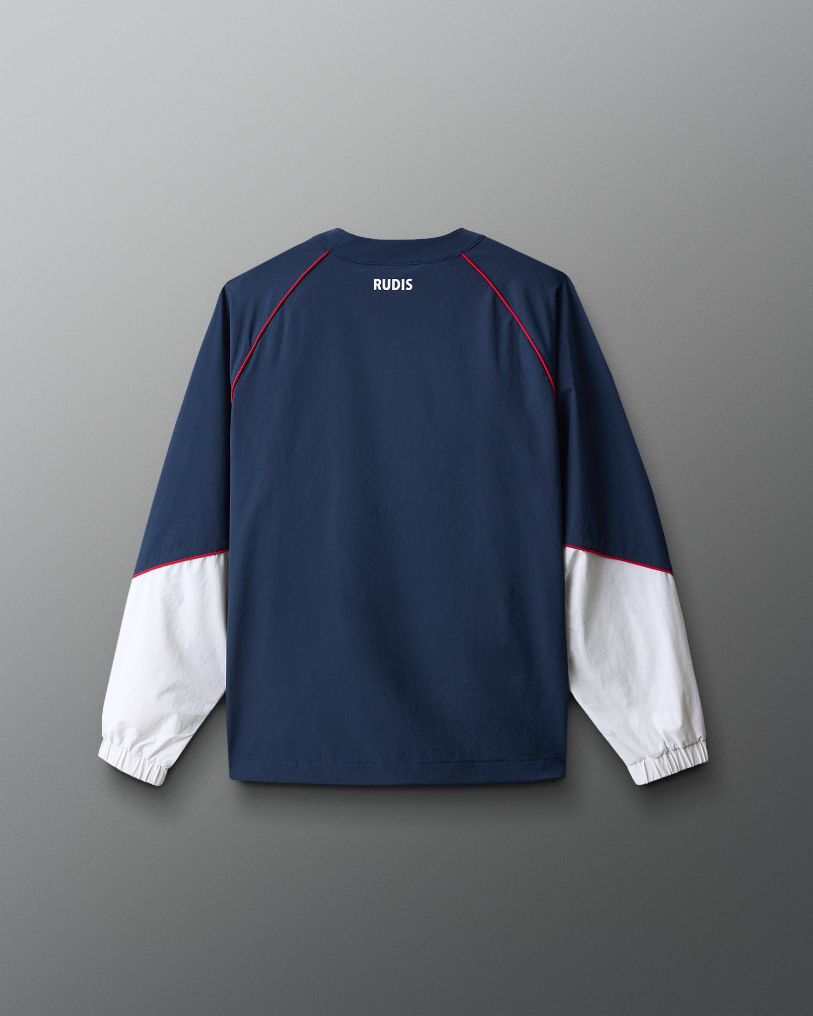 Navy and white long-sleeve shirt with 'RUDIS' branding on a gray background