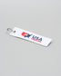 USA Wrestling keychain on a gray background
