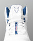 White wrestling shoe with blue accents and a logo on a gray background