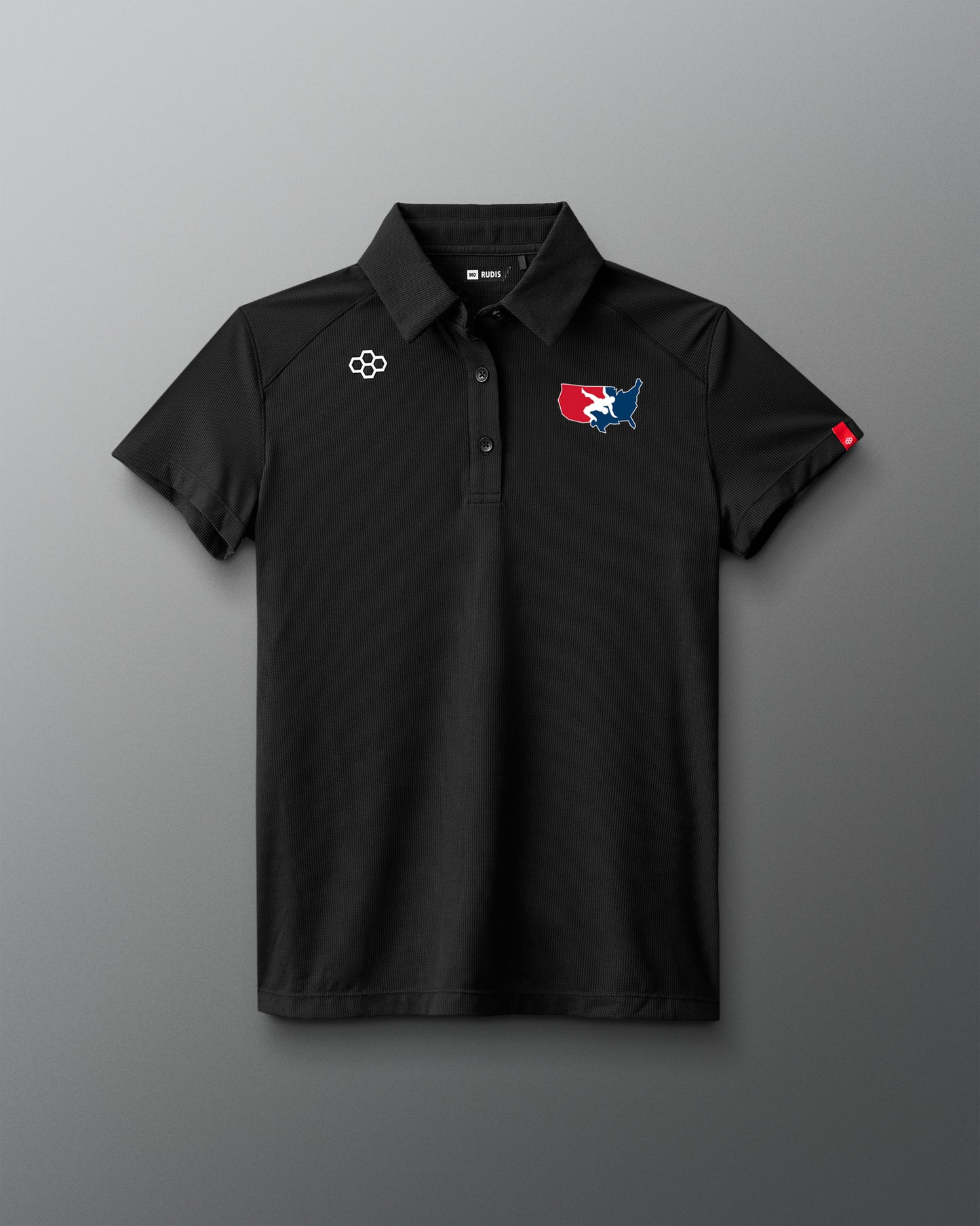 Black polo shirt with logos on a gray background