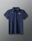 Navy blue polo shirt with logos on a gray background