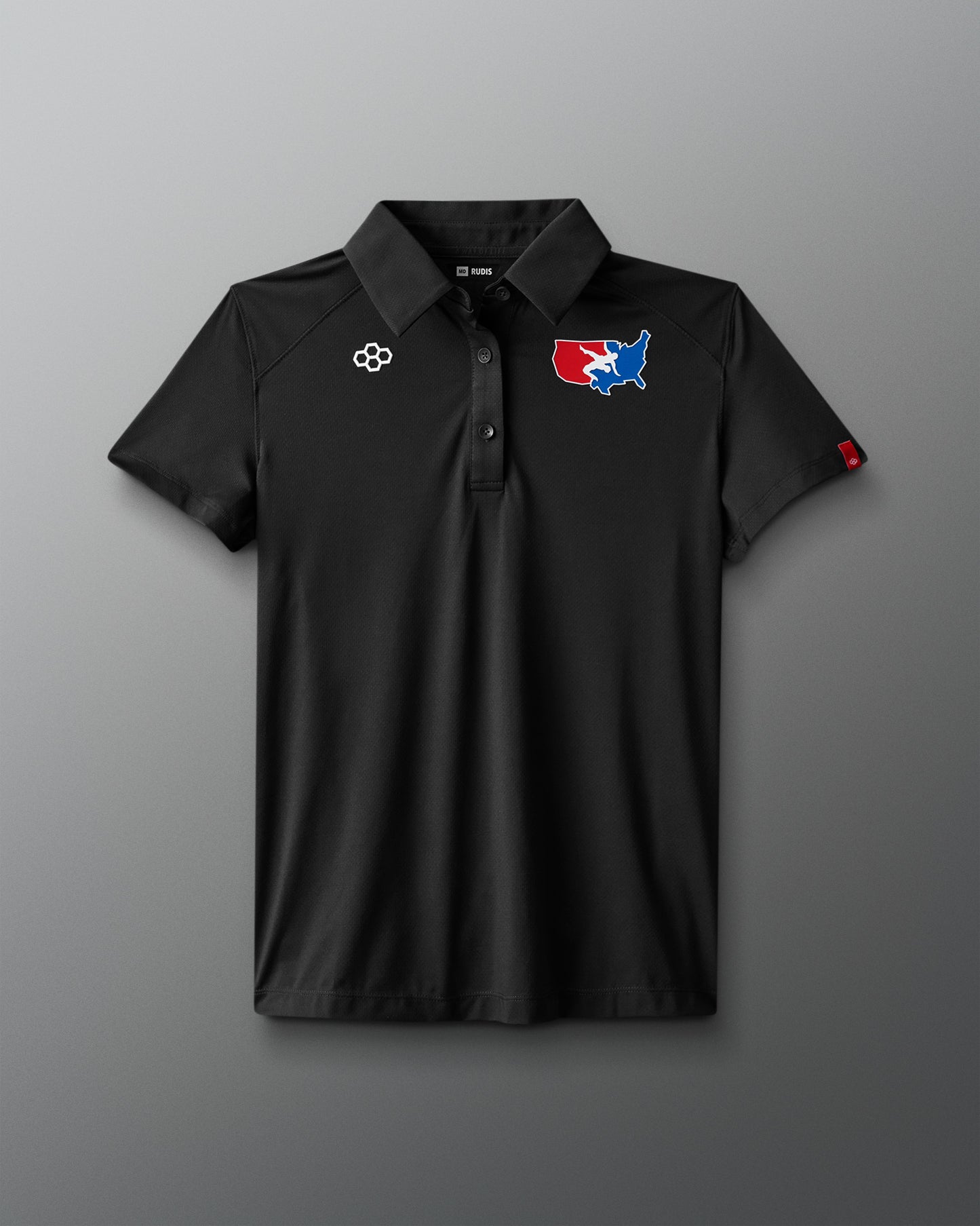 Black polo shirt with logos on a gray background