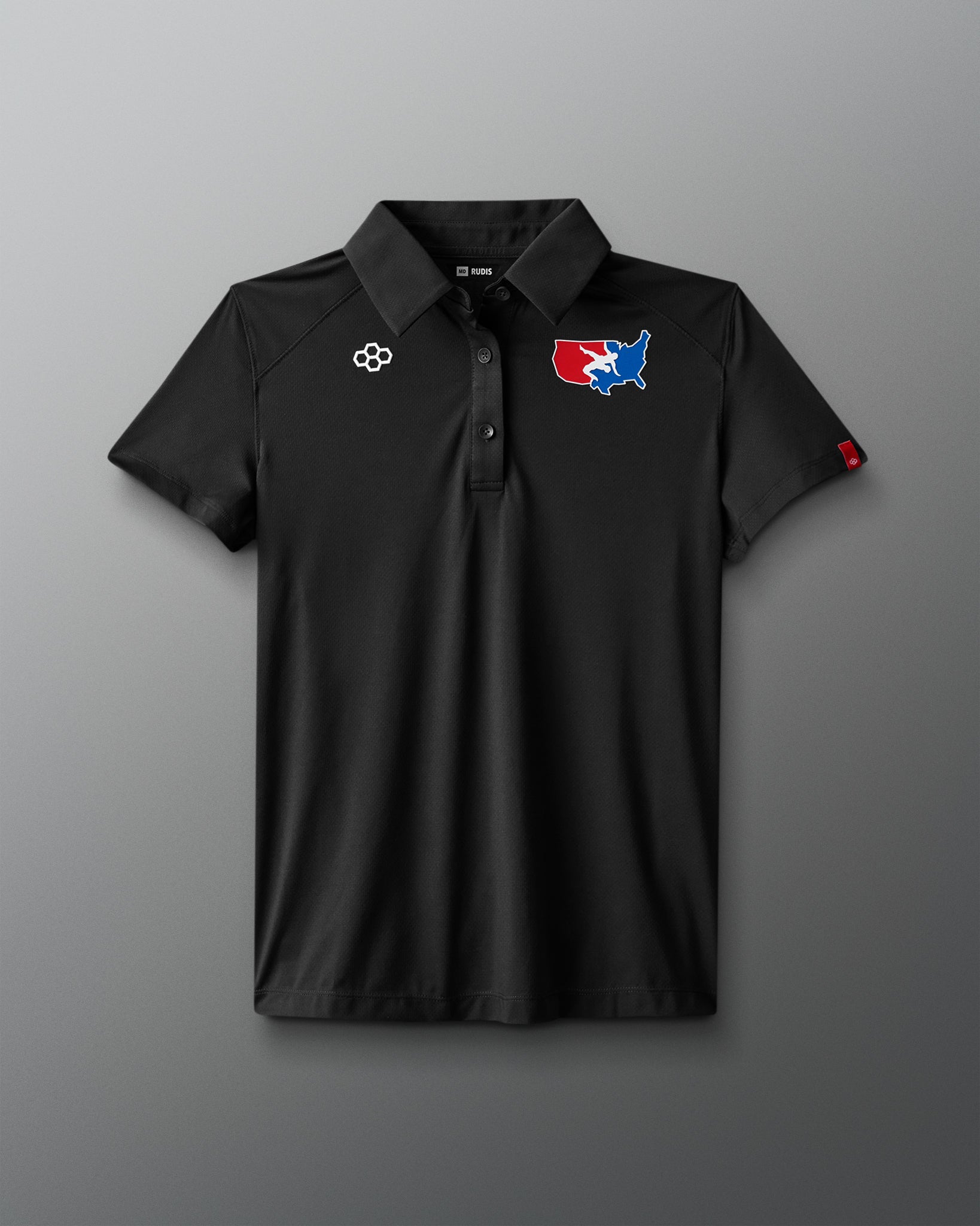 Black polo shirt with logos on a gray background