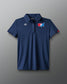Blue polo shirt with logos on a gray background