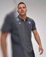 Man wearing a gray polo shirt with 'USA Wrestling' and "RUDIS' logos on a gray background