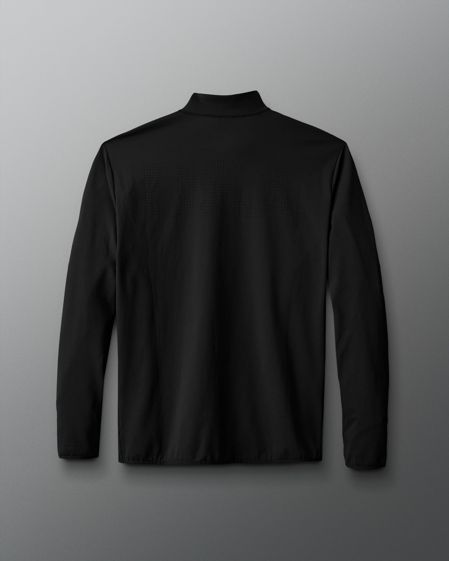 Black long-sleeve shirt on a gradient blue to red background