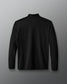 Black long-sleeve shirt on a gradient blue to red background