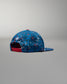Blue and red patterned cap on a gray background