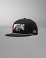 Black wrestling cap with USA flag on a gray background