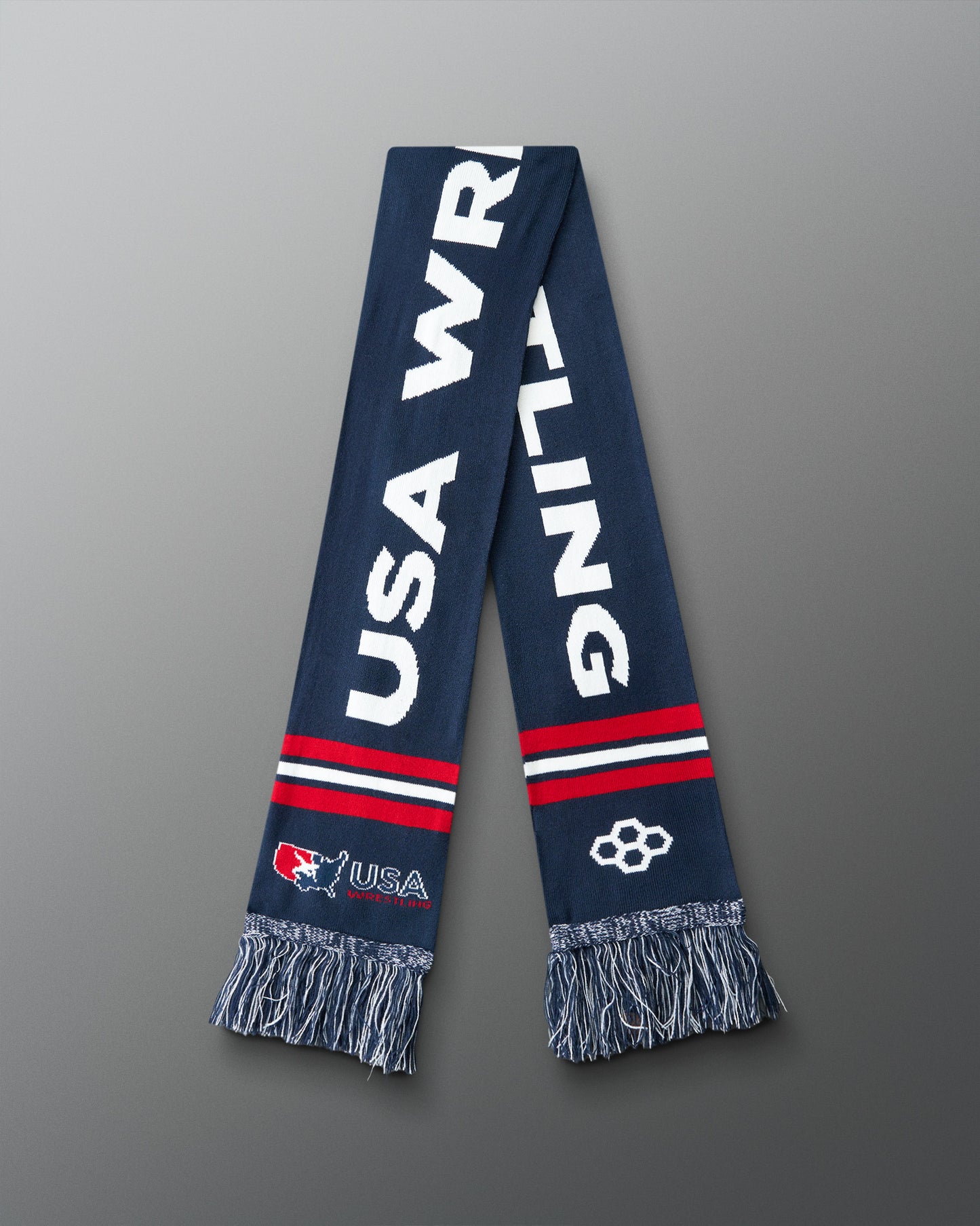 Navy blue scarf with 'USA Wrestling' text on a gray background