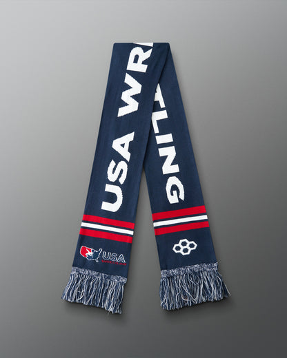 Navy blue scarf with 'USA Wrestling' text on a gray background