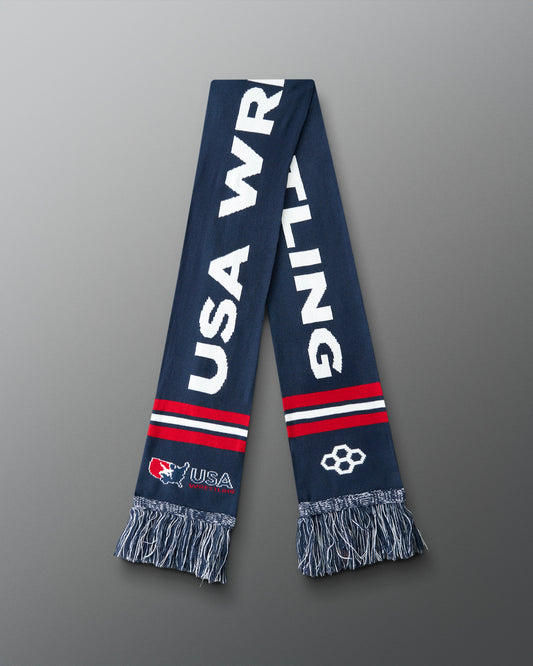 Navy blue scarf with 'USA Wrestling' text on a gray background