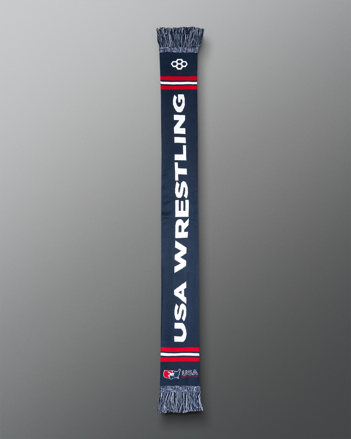 Navy blue scarf with 'USA Wrestling' text on a gray background