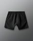 Black shorts on a gray background