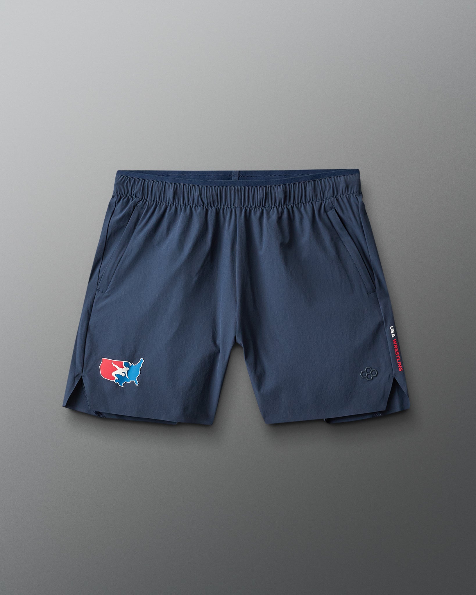 Blue athletic shorts with a USA Wrestling logo on a gray background