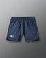 Blue athletic shorts with a USA Wrestling logo on a gray background