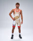 A male model wearing a USA Wrestling singlet in a gold, white, and red color scheme, standing against a light gray studio background.