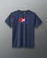 A navy blue short-sleeve athletic T-shirt is displayed against a gray background. Centered on the chest is a red, white, and blue USA Wrestling logo shaped like the continental United States, featuring two wrestlers in action. The shirt has a modern athletic fit.